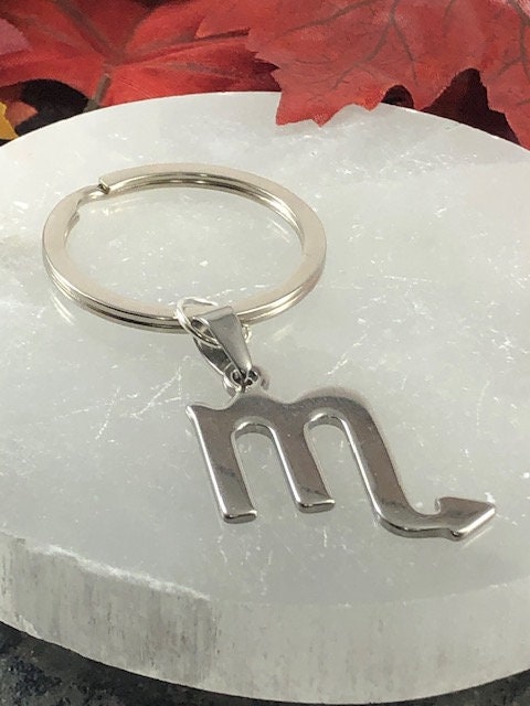 30% OFF Silver Scorpio Zodiac Keychain: Birthday Gift + Organza Bag